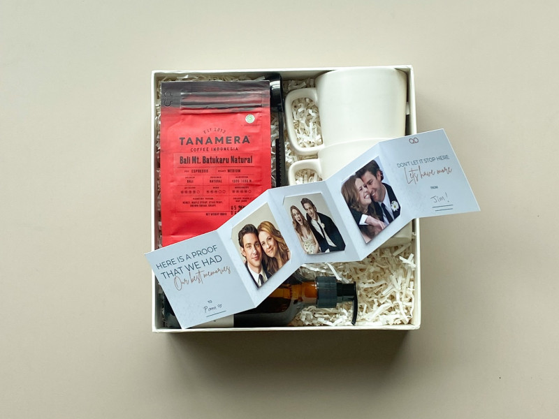 Arrange the gift box content neatly, then put on a personal greeting card along with bonus surprises for him